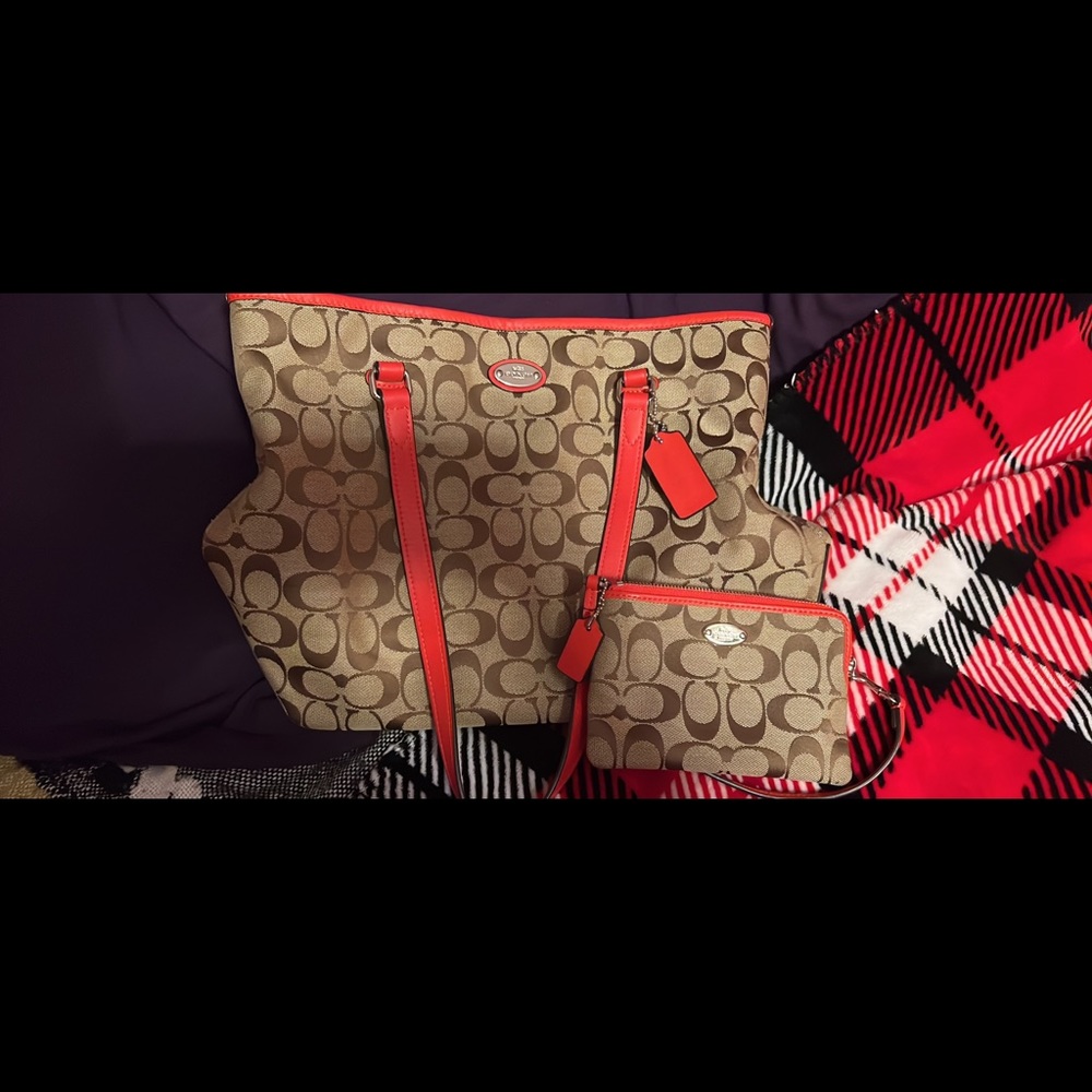 Coach purse, lightly used, some pen marks on inside.